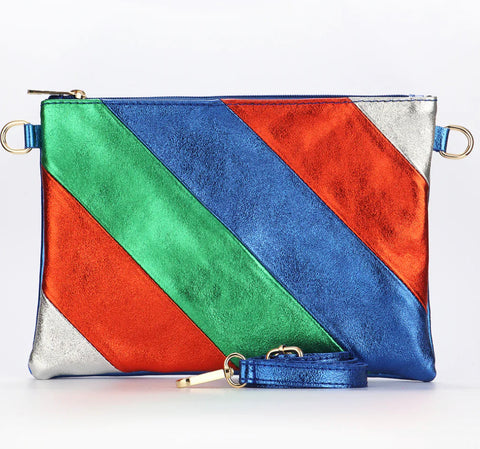 Be fashion-forward and functional with our Leather Rainbow Striped Clutch Bag in royal blue. Expertly crafted in Italy, this versatile bag easily transforms from a clutch to a crossbody with a removable strap. Perfect for day or night, its bold rainbow stripe design adds a touch of fun to any outfit.     Rainbow Stripe Italian Leather Wristlet Clutch Gold Hardware Removable Wrist Strap Removable and Adjustable Strap Inner Pocket with Zip Closure 28cm x 19cm x 2cm 100% Leather Wipe Clean  