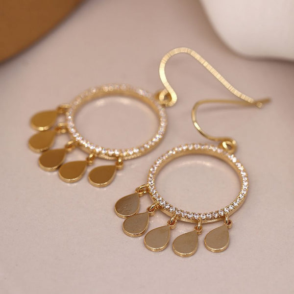 Gold plated crystal inset circle drop earrings with multiple golden teardrop charms.