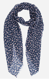 This ditsy floral print scarf in navy blue and cream offers lightweight comfort for all-day wear. Its stylish design makes it a versatile accessory, while its lightweight fabric provides both comfort and style. Elevate your outfit with this must-have scarf.  Material - viscose    180 x 90 cm 
