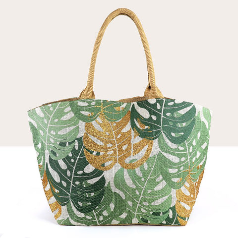 Carry nature with you everywhere you go with our Leaf Jute Bag in a gorgeous green hue. Made from durable jute material, this shopper bag features a beautiful monstera leaf print in gold. Finished with comfortable cotton handles, it's perfect for your everyday errands or a trip to the beach.