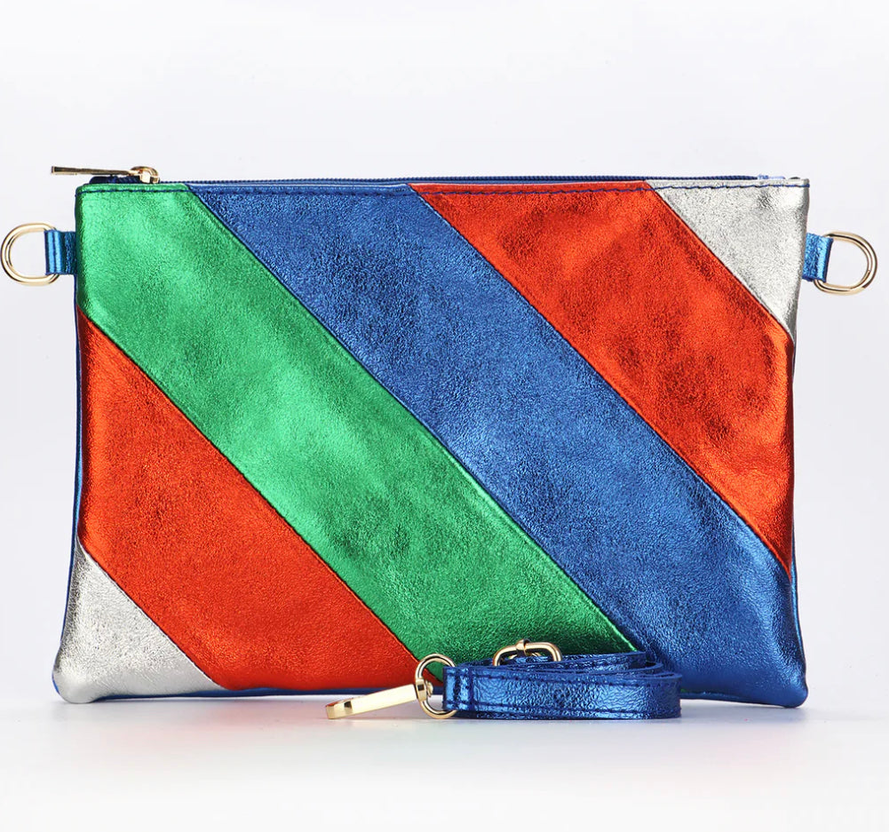 Be fashion-forward and functional with our Leather Rainbow Striped Clutch Bag in royal blue. Expertly crafted in Italy, this versatile bag easily transforms from a clutch to a crossbody with a removable strap. Perfect for day or night, its bold rainbow stripe design adds a touch of fun to any outfit.     Rainbow Stripe Italian Leather Wristlet Clutch Gold Hardware Removable Wrist Strap Removable and Adjustable Strap Inner Pocket with Zip Closure 28cm x 19cm x 2cm 100% Leather Wipe Clean  