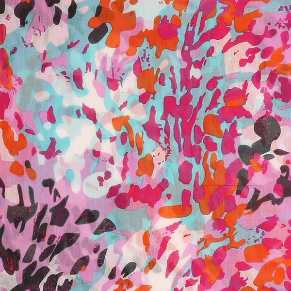 Made from soft, organic cotton, this scarf features a unique scattered animal print in striking shades of pink, red, and aqua. Perfect for adding a pop of color to any outfit, while staying environmentally conscious.  .Approximate size 100cm x 180cm  100% Organic cotton