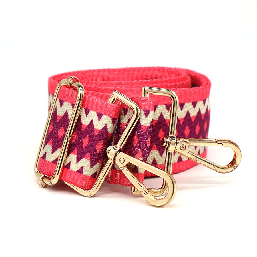 Vibrant pink, purple and ecru woven zig-zag diamond bag strap with golden clips and adjustable length.