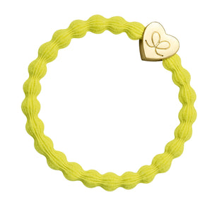  By Eloise Bangle Band -Yellow / Gold HearGold heart on bubble elastic hairband.  Keep flyaways out of your face with this fun and super stretchy gold heart hairband. Wear it as a cute bracelet when not worn in your hair.t 