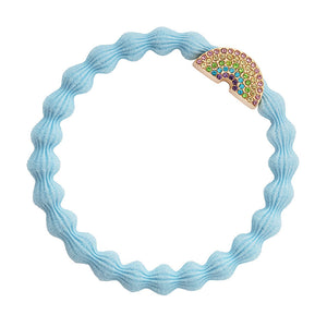 Rose gold rainbow with pink , yellow , green , blue and purple diamanté on sky blue wrist bubble band   A pretty rainbow to wear in your hair and wrist!