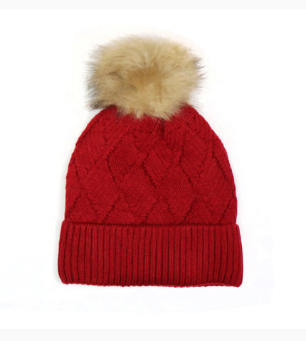 Red diamond knit, lined bobble hat with ribbed turn up and faux fur bobble.  Wool mix 