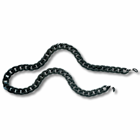 Keep track of your glasses and complete your outfit with our new chunky glasses chain in black . This chunky chain has adjustable silicone closures to fit any pair of glasses.   Length: 70 cm. Link size: 2x1,5 cm  Material: acrylic, silicone, nickel free metal.
